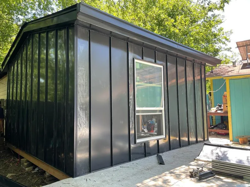 Black standing seam metal wall panels for Metal Roof Installation in Newton